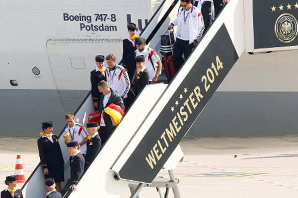 Photo - World Cup heroes return to rousing welcome