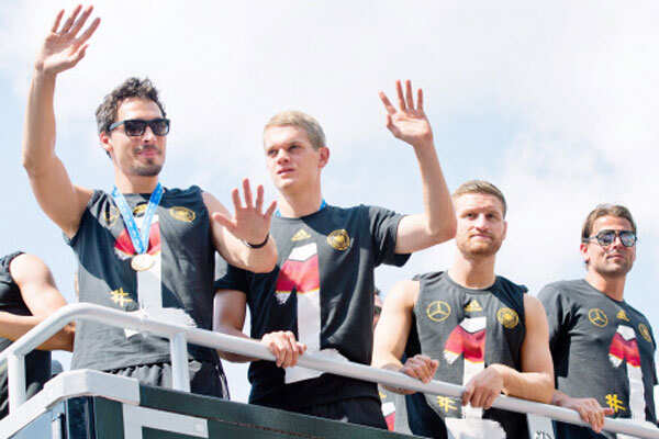 Photo - World Cup heroes return to rousing welcome Photo - World Cup heroes return to rousing welcome