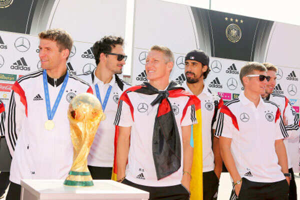 Photo - World Cup heroes return to rousing welcome