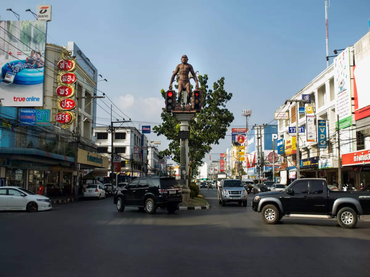 Cavemen traffic lights in Krabi, Thailand Cavemen traffic lights in Krabi, Thailand