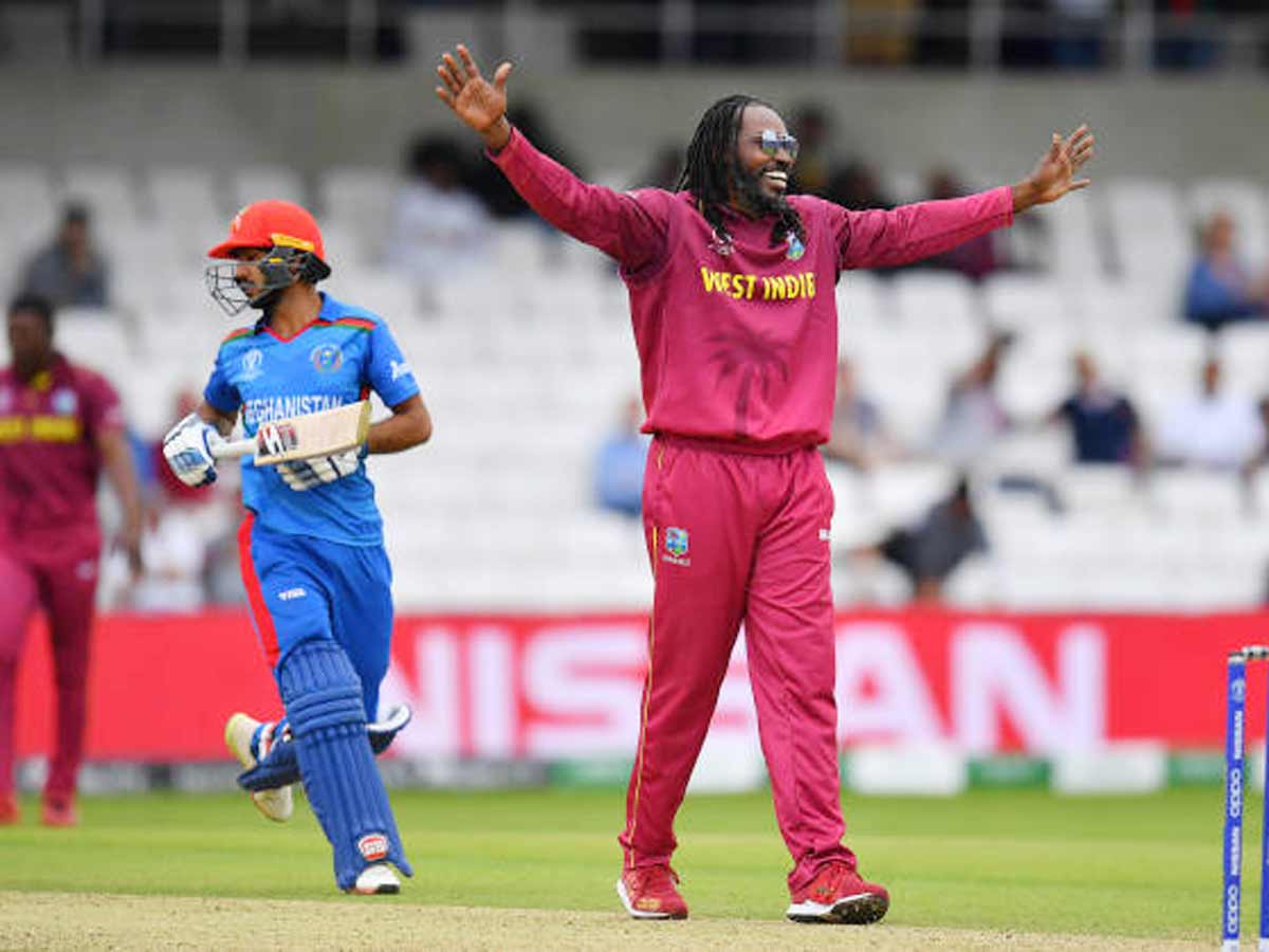 Chris Gayle strikes with the ball