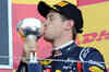 Vettel seals second F1 title, Button wins race