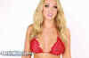 Model Carra O'Sullivan in itsy-bitsy red polka dot bikini