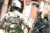 Security forces battle militants in Sopore