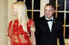 Couple crashes Obama-Manmohan dinner