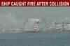 Warship catches fire after collision with cargo vessel