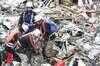 US sends 150 rescue workers to quake-hit Japan