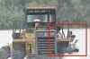 China: Dramatic rescue of couple by bulldozer