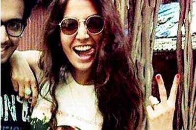Monica Dogra does the Miley tongue act