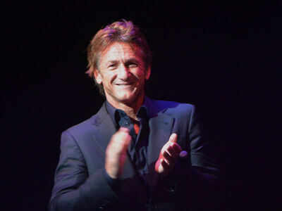 Sean Penn gets rid of guns for Charlize Theron