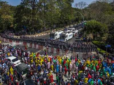 Hit by US curbs, Myanmar general calls for end to mass gatherings